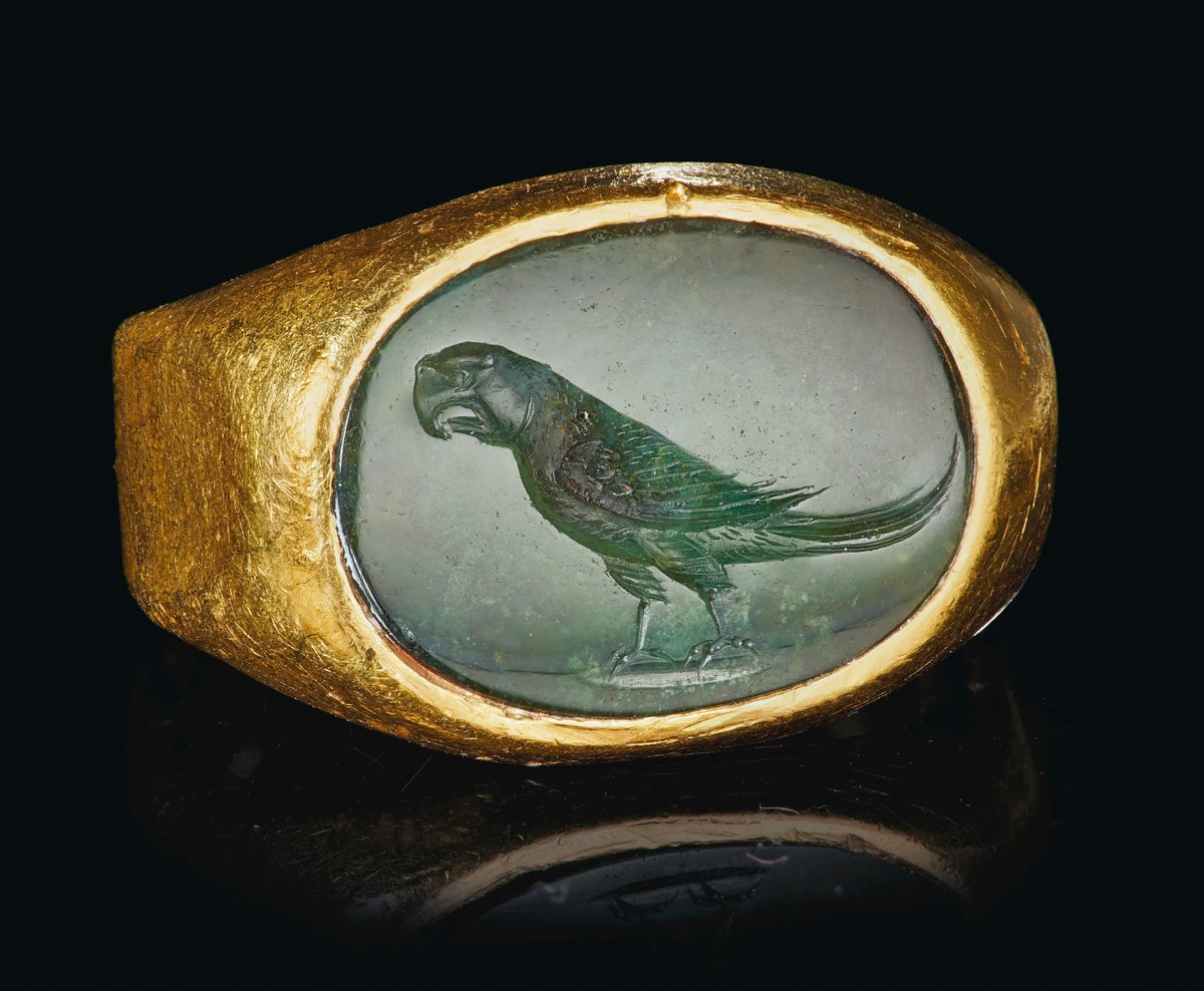 OptimoPrincipi's tweet photo. Roman gold and green chalcedony ring engraved with a parrot. The carving is so detailed, the parrot can be identified as an Indian Ringneck known for its bright green plumage. Such parrots surprised Alexander the Great’s entourage in India by talking like humans. 1st century AD https://t.co/tpo3CYbKjc