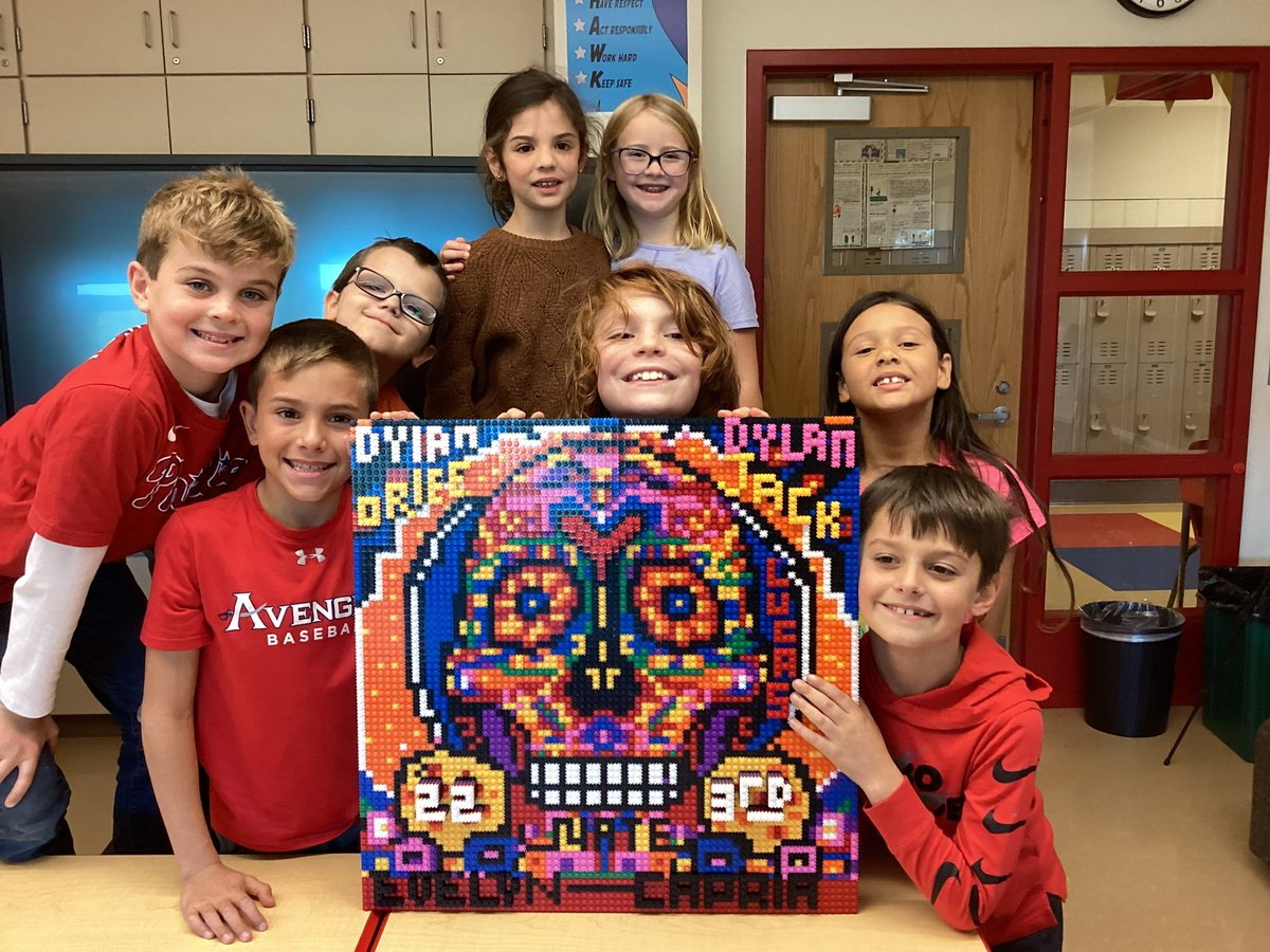 And third grade finished their Día dep Muertos Pix Brix mosaic. “We did it!” they cried. pix-brix.com
