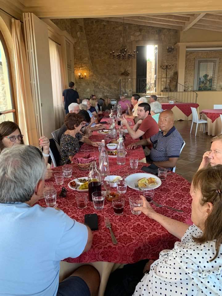 My beloved brother enjoying a noontime repast in Italy. Salut!