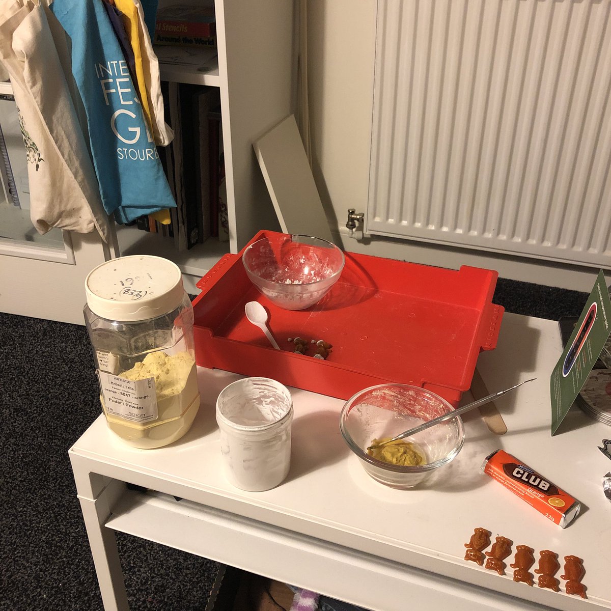rachel__elliott's tweet image. A typical school night, casting glass cats and painting them with a little orange biscuit to sustain the production! @TheStourbridge @McVities #GingerRules #CatsOnTwitter