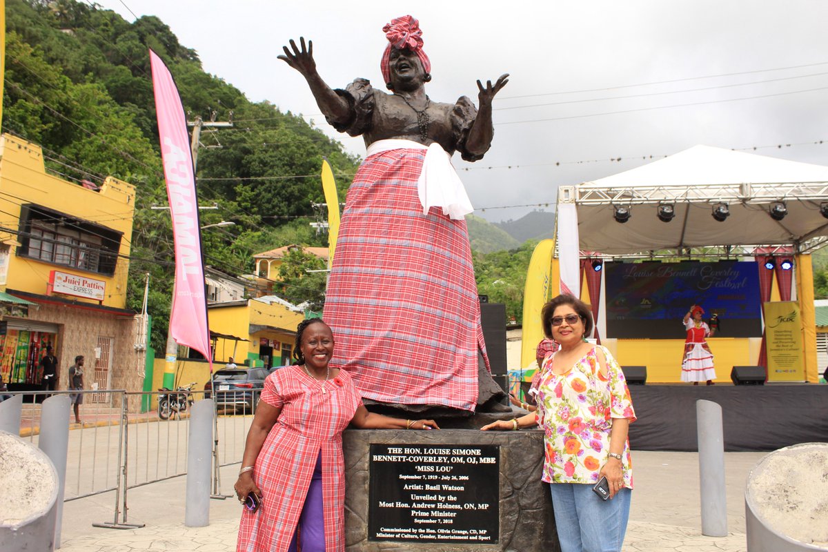 festivallbc's tweet photo. Prof @OpalPalmerAdisa and Committee Member @LowrieChin stand with #MsLou at the @festivallbc over Heroes Weekend. @TaniaHe89799132 thrills the audience in the background. #culture #festivallbc #event #Jamaica https://t.co/sGqVQP0QWp
