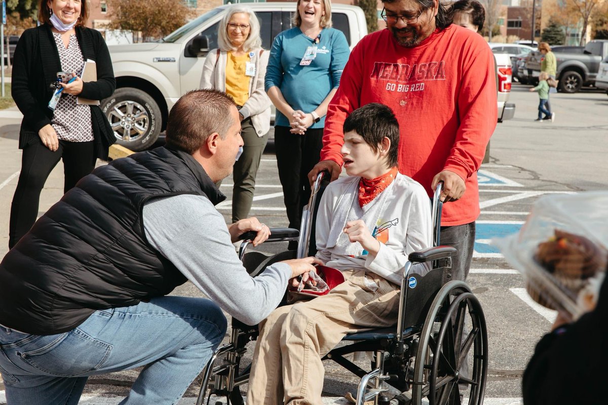 Chariots4Hope's tweet photo. Special blessing today for 2  AWESOME individuals at Children's Hospital &amp; Medical Center. Roberto a single dad to Christian (16) who has Angelman Syndrome. Roberto has carried his son to/from his vehicle all these years. Christian having to miss out on so much. Not anymore! 🙌🏼 https://t.co/YoGYvZkUrz