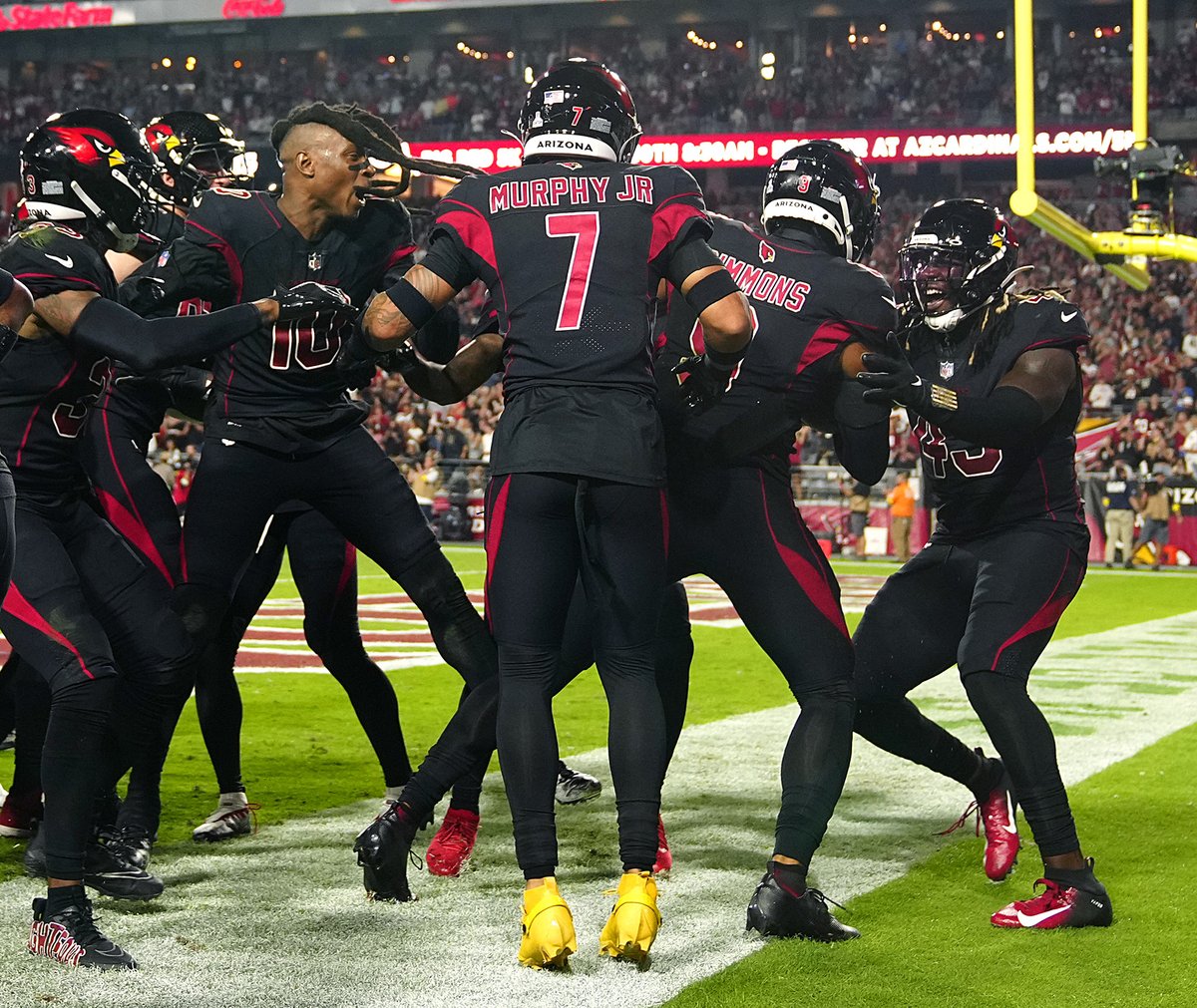 Hopkins charged onto the field to celebrate with Isaiah Simmons after that interception returned for a TD.