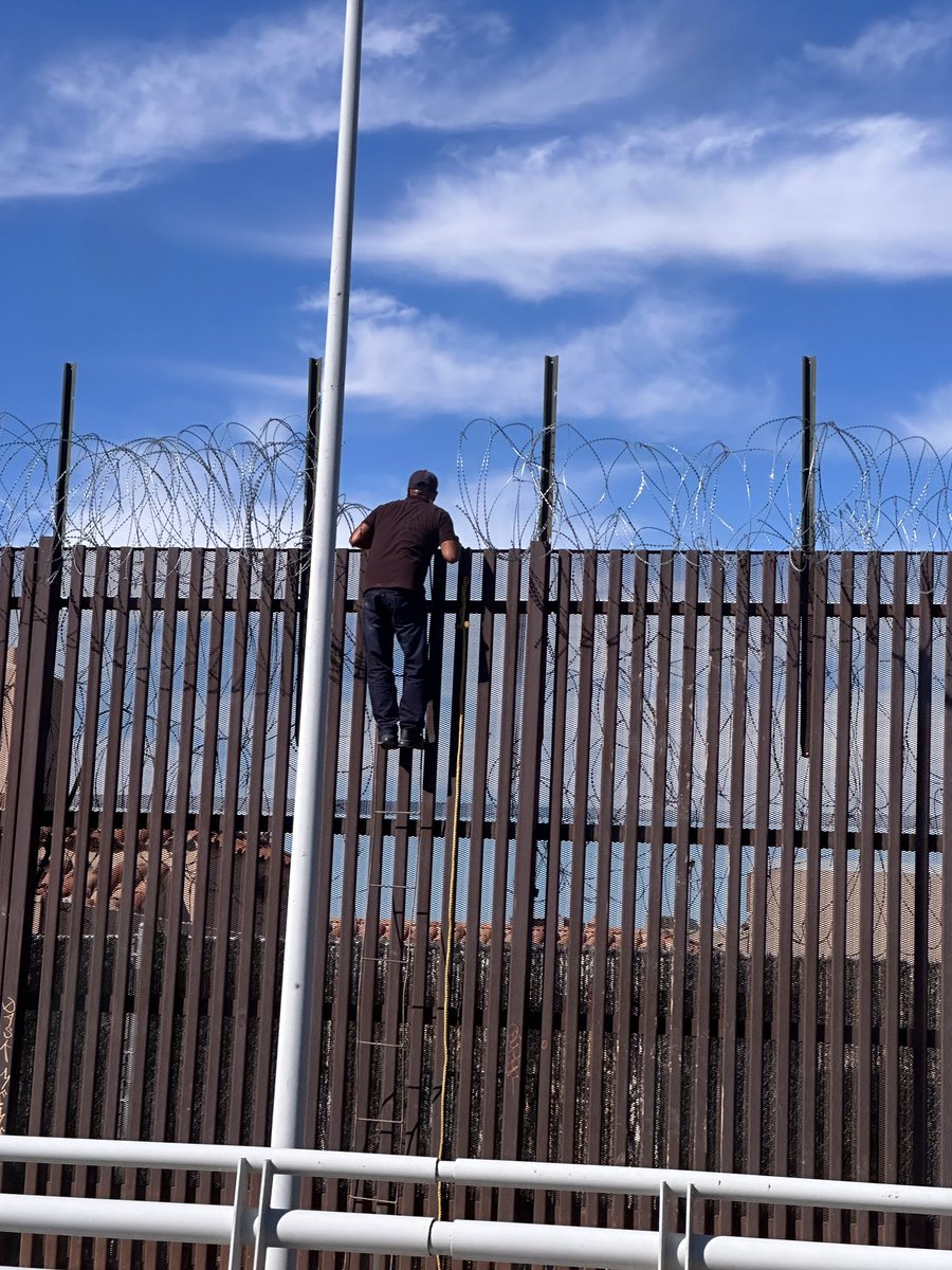 If you don’t think we have a boarder issue, you are out of touch.  This picture was taken today as I was riding to the Mexicali boarder crossing, less than 1/2 mile to my drop off point to come back to the USA.  He cut through the barbed wire at 2:26 pm.