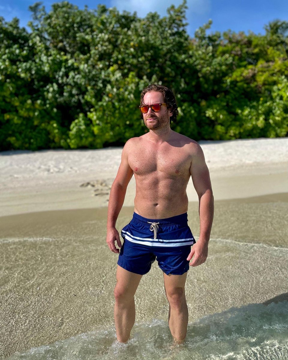 squoof's tweet photo. Rockin the #FairHarbor Anchors between shows ⚓️🩳🌴🎸🎶
.
.
#tourlife #music #band #guitarist #maldives #fairharbor #anchor #beach #swimmingtrunks https://t.co/qNMzNgkBrg