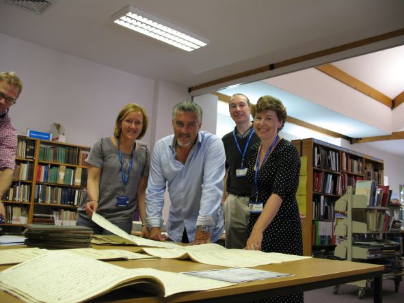 CumbriaArchives's tweet photo. Reminiscing about the time Paul Hollywood visited #WhitehavenArchives for a TV show back in 2013.  He looks fascinated by our documents! #EYAThrowback @explorearchives https://t.co/Xl2z098Ybk