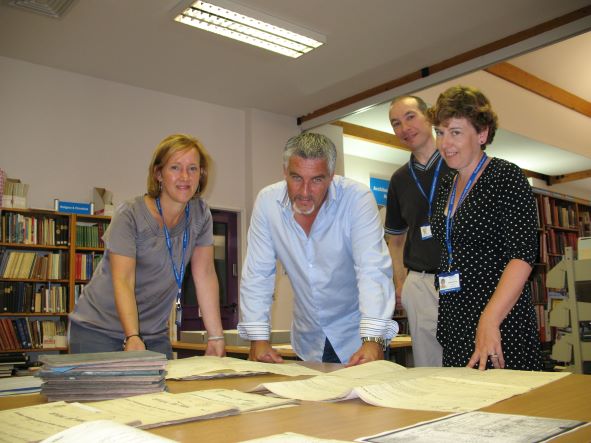 CumbriaArchives's tweet photo. Reminiscing about the time Paul Hollywood visited #WhitehavenArchives for a TV show back in 2013.  He looks fascinated by our documents! #EYAThrowback @explorearchives https://t.co/Xl2z098Ybk