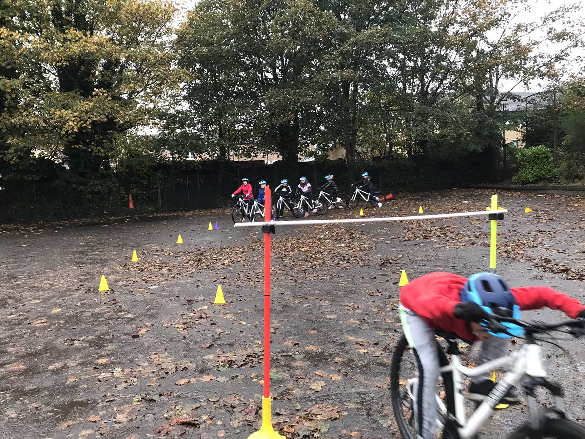 GoRideGlasgow's tweet photo. The young crew at St Paul’s Primary making the best of a very wet day in Glasgow. Unlike the cameraman! 😂@GoRideGlasgow @AchieveMoreSCT https://t.co/bBK8VLWPR3