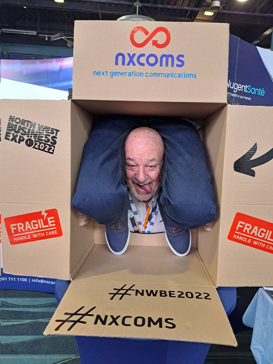Jasonreamagic's tweet photo. The mission is simple, how many people can we squash in a box?? Come and have a go on the @nxcoms stand at the #nwbe22 #nxcoms https://t.co/tV0ro53GZU