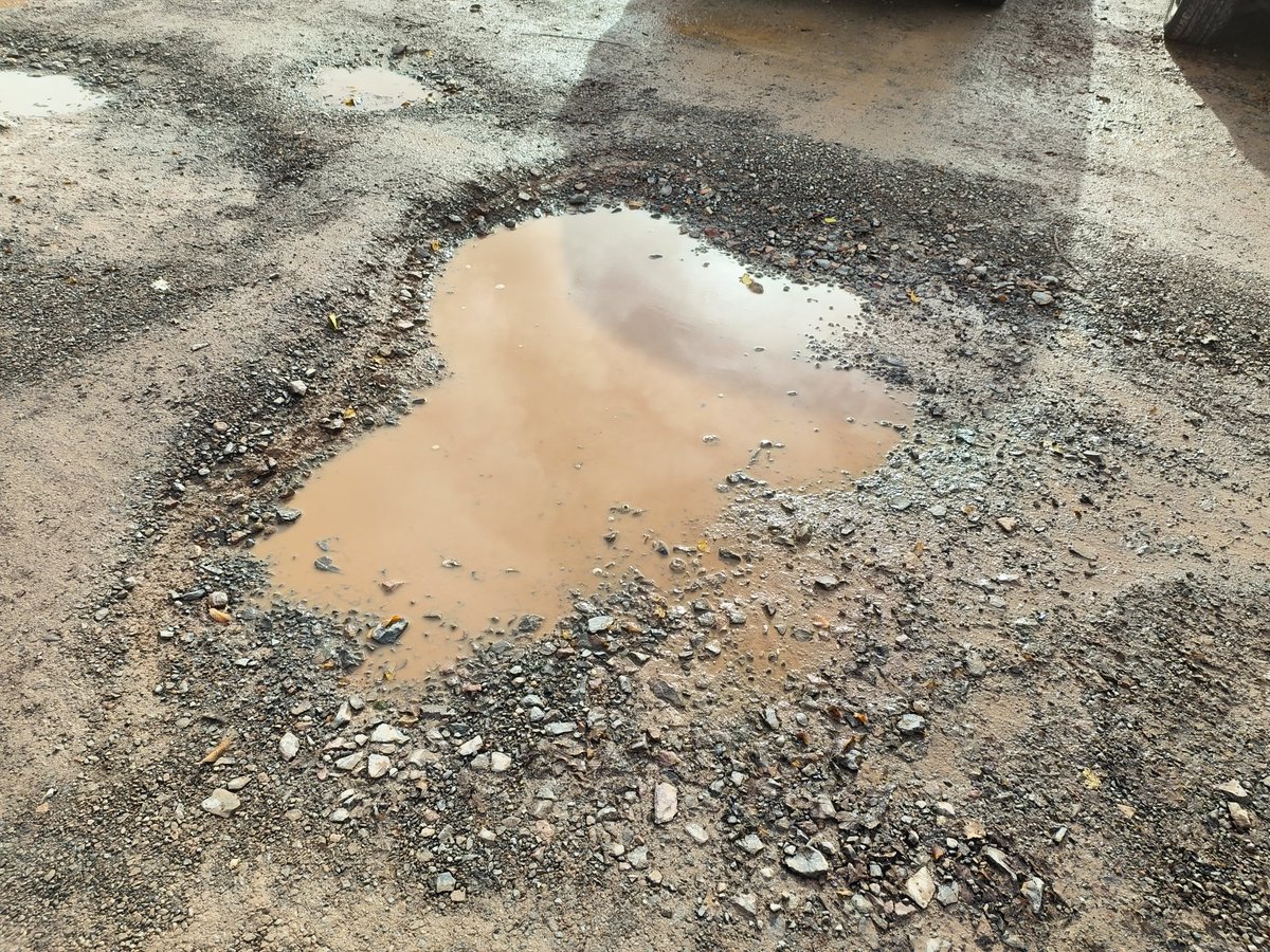 coreyweasley's tweet photo. @cardiffcouncil I'm not sure how anyone deems the state of this car park as acceptable. Pot holes up to 8 inches deep, has already caused damage to the suspension of my car. Many angry parents share the same sentiment. This is Twinkle Stars @ Willows High School https://t.co/54xpcXCILh
