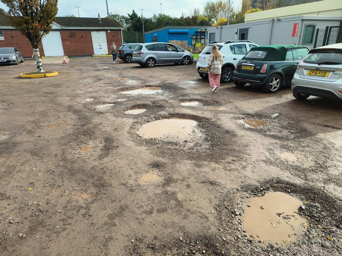 coreyweasley's tweet photo. @cardiffcouncil I'm not sure how anyone deems the state of this car park as acceptable. Pot holes up to 8 inches deep, has already caused damage to the suspension of my car. Many angry parents share the same sentiment. This is Twinkle Stars @ Willows High School https://t.co/54xpcXCILh