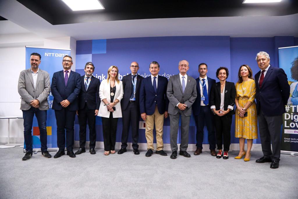 malaga's tweet photo. El alcalde, @pacodelatorrep, junto a los consejeros de @InteriorJunta, @antoniosanz, y @EconoHaciendAND, @CarolinaEspanaR, ha asistido este mediodía a la inauguración de la nueva oficina de la empresa @NTTDataSpain en Málaga https://t.co/pbk1sYsnUy