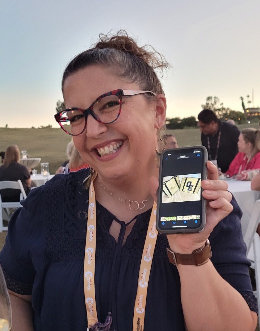 We love getting to connect with customers at events. We recently bumped into Kelley Rice, President of Imagination Print and Design, at the ASI Connex reception. She pulled out her phone to show us pictures of all of the cool bags we’ve done for her! Thanks for sharing, Kelley!