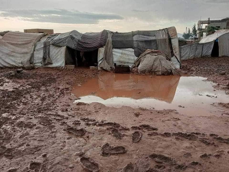sy____19951's tweet photo. Al-Balaโa camp, west of Idlib, after the first rainy day, a harsh winter knocking on the doors, and a world ignoring the tragedy of the displaced.
#whitehelmets
#syria_edlib https://t.co/uat0chZEkY