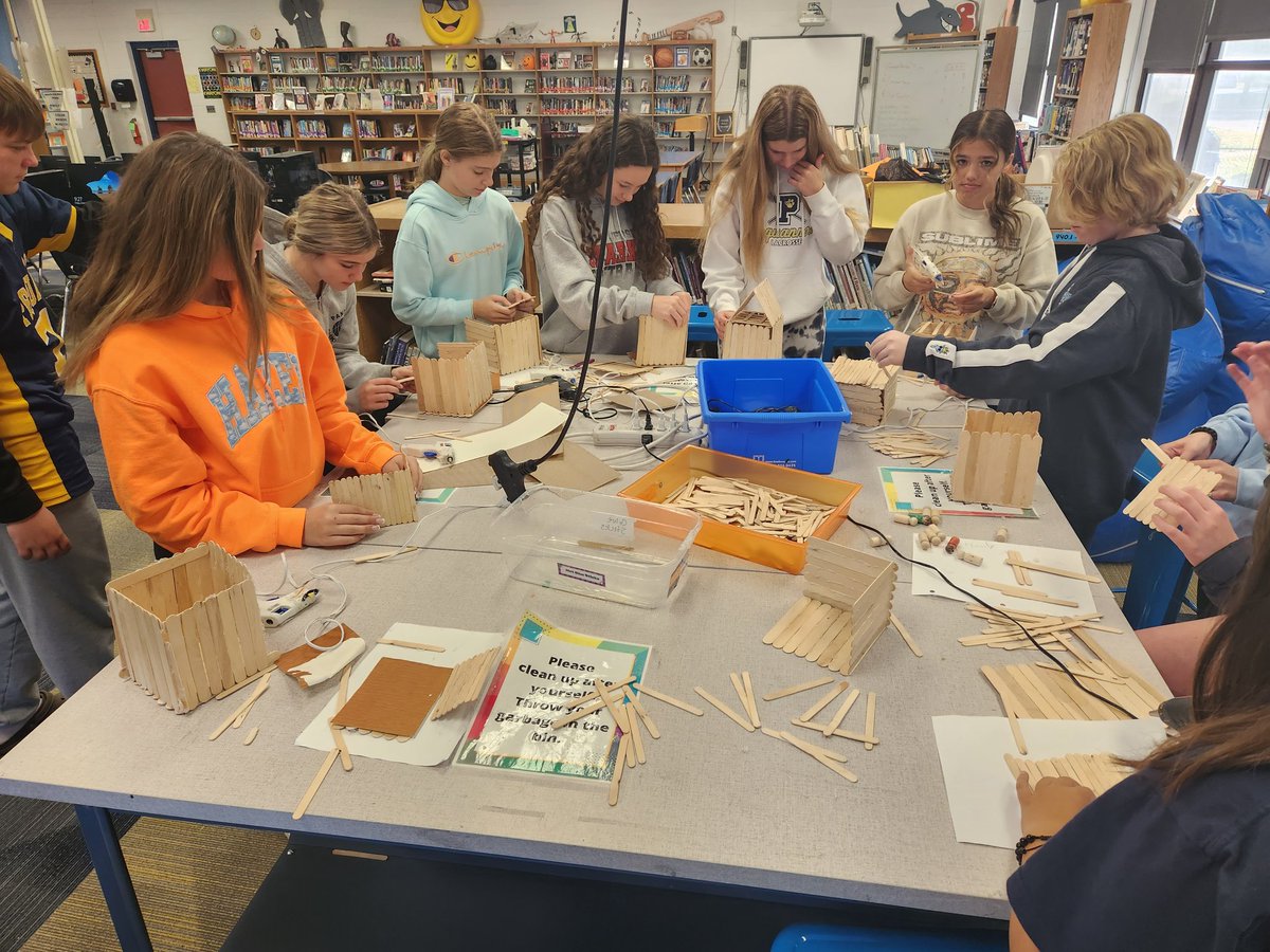 PVMS_library's tweet image. Ms. Freebody&apos;s 8th Grade Ss using our #makerspace to make houses. The houses represent the format of a body paragraph: thesis statement= roof which needs to be supported by the walls or main ideas, and the floor is the clincher. @PVPantherPride