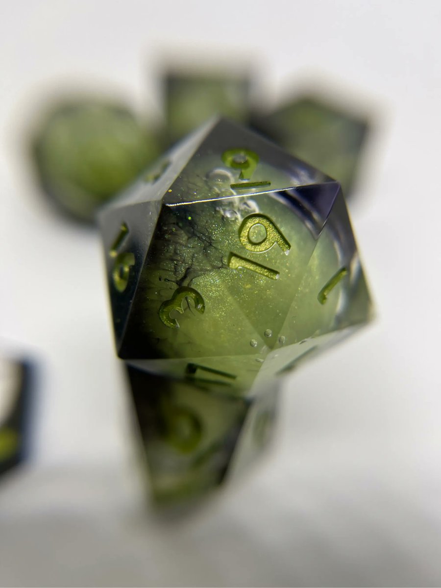 💚🧙🏼‍♀️ Witch’s Brew 🧙🏼‍♀️💚

My first liquid core set! And what better theme than a bubbling potion? 🧙🏼‍♀️ #dice #resin #Dnd #ttrpg #handmadedice