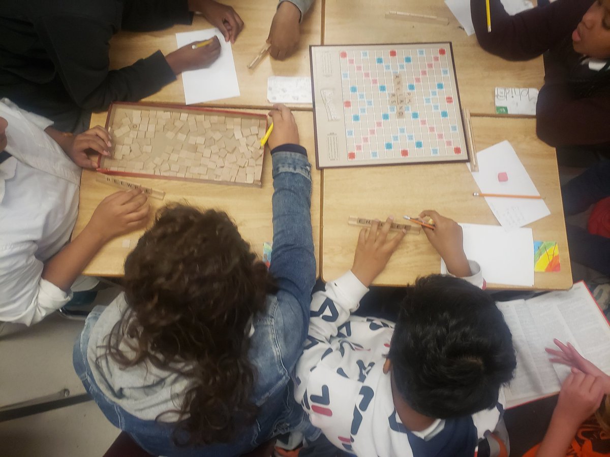 teachlearn4life's tweet photo. It's a Word Work kind of day. Students @MilitaryTrailPS are having fun with @scrabble. Communication, cooperation, decoding and phonetical awareness! I think I need two more boards though. @TDSB_EngLit https://t.co/fU4npIXsWf