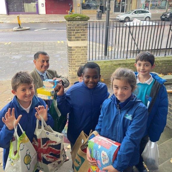 This week we invited our CEO <a href="/counter_sarah/">Sarah Counter</a> and Father Tom from Christchurch, to join our Harvest Festival assembly. Following our readings and songs, Year 6 joined Principal Martin Blain to deliver our food collection.