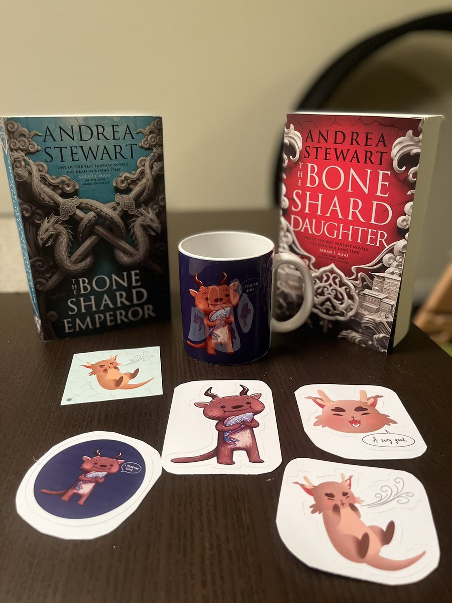 Happy Friday!! Time for another INTERNATIONAL giveaway! This is for the UK version of THE BONE SHARD DAUGHTER and EMPEROR paperbacks, a Mephi mug (he is saying “I deserve this” while holding a fish), and your choice of Mephi sticker. RT and follow to enter, ends 10/25 at 4pm PST!