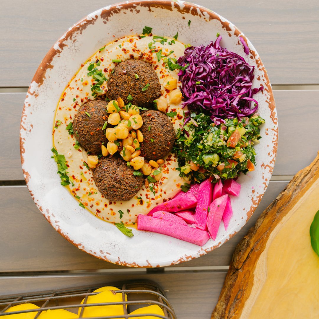 Falafel Friday!

Our classic Lebanese falafel is made to order and can be had in a hummus, rice, or salad bowl. Order a falafel shared plate so everyone can have a bite. Or feed the whole family and order falafel in your dinner special or mezze dinner.