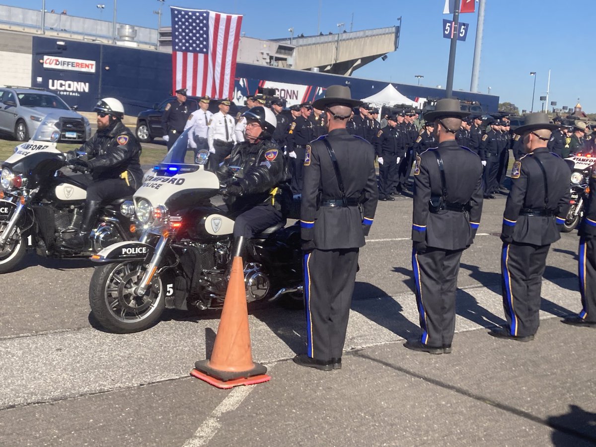Hundreds of police on motorcycles - including 25 from the NYPD alone - arrive at Rentschler
