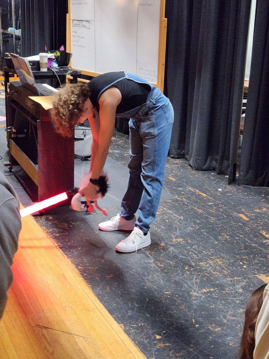 ChorusNipmuc's tweet photo. Friday Fun in Vocal Ensemble! 🎼🎤

(when you have access to an air traffic control wand, you feature it heavily in your rehearsal. and then you take a dramatic selfie at the end of class)

Conducting is so much more fun with a lightsaber!

#mursdmusic #nipmucpride https://t.co/bPYT5OHAEE