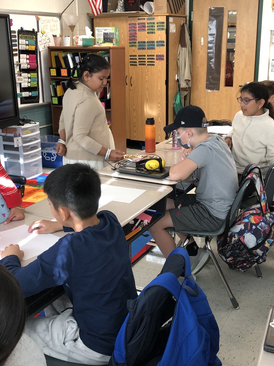 Two students teaching our class about their Diwali traditions! The class loved learning about this important holiday! Our two presenters were amazing!! <a href="/GuilfordEle/">Guilford Elementary School</a> <a href="/GuilfordPta/">Guilford Elementary PTA</a>