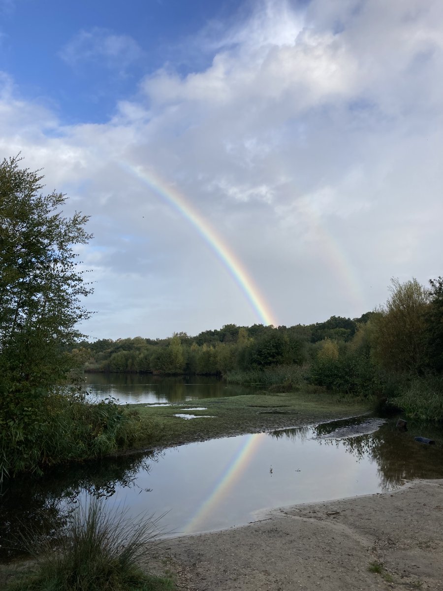 FleetPondSoc's tweet photo. Fabulous rainbow at the Pond this morning. The reflection gives the impression it's the wrong way up. Think there was the ghost of a second rainbow alongside it. #fleetponds https://t.co/QIAEZdkq0t