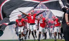 BrunswickFB's tweet photo. SEC college football program in the door this morning at Brunswick High! Thank you @GeorgiaFootball @CoachWMuschamp for spending some time talking about our Pirate Football prospects! 🟦🟨🏴☠️⚓️☠️ #AllAboutTheFamily #PiratePride #RecruitBHS #StopByTheHigh https://t.co/kP8mhx1aDR