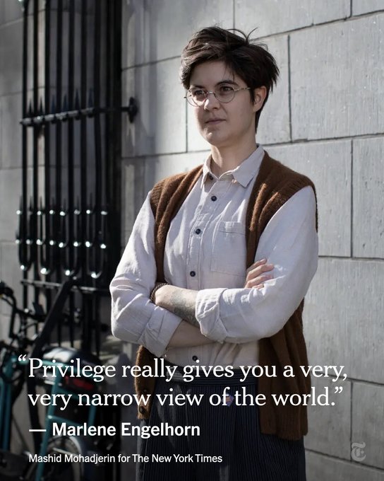 Marlene Engelhorn stands on a street with her arms crossed. A quote from her reads: "Privilege really gives you a very, very narrow view of the world." Photo by Mashid Mohadjerin for The New York Times