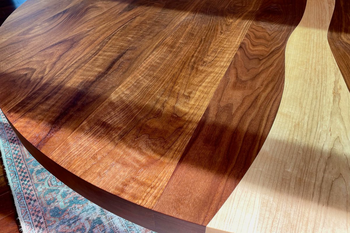 KeefriderCustom's tweet photo. Happy in its new home! 6 feet wide and 3 inches thick of solid black walnut with a figured maple river. Phew! Needed the muscles for that delivery. https://t.co/cZWBfbNyin