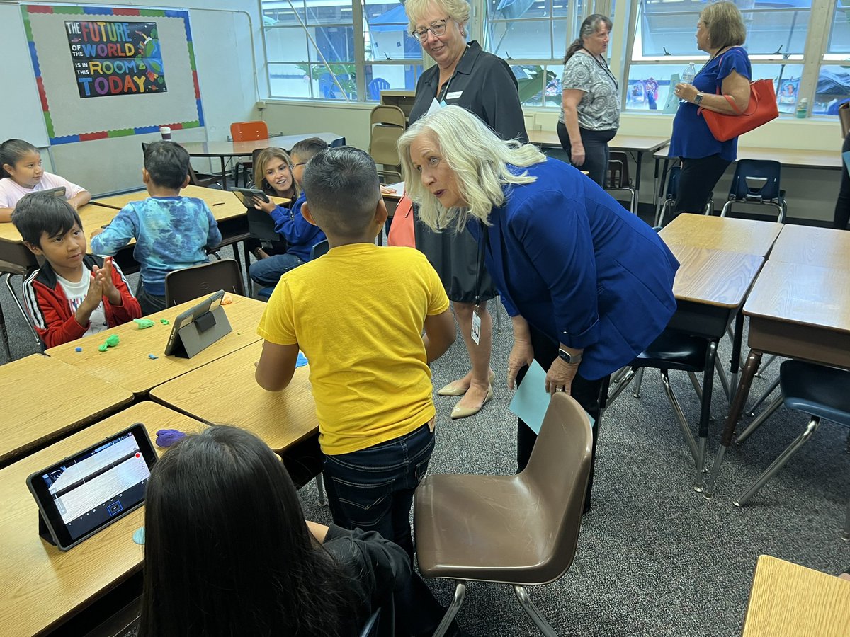Board Vice President Debbie Morton reviews facility improvements with Superintendent of Public Instruction Tony Thurmond and State Board Member Escobedo.