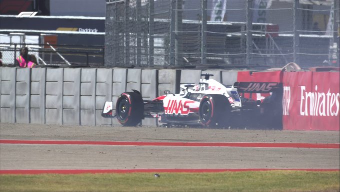 The Haas of Antonio Giovinazzi is seen in the wall, with the rear-right tyre dug into the barrier