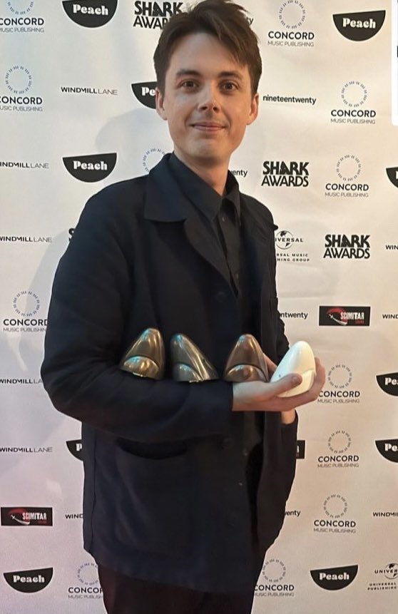 .<a href="/hughmanji/">Hugh</a> at the <a href="/SharkAwards/">The Shark Awards</a> in Brighton collecting our little sharks! 🦈 

He’s got a lot to celebrate as he’s collecting our awards for:
🥇 Gold - <a href="/TUS_ie/">Technological University of the Shannon</a> brand 
🥈 Silver - <a href="/wiredfm/">Wired 99.9FM</a> logo
🥉 Bronze - 100 Women of Limerick, <a href="/OrmstonHouse/">Ormston House</a> 
🏆 Irish Design Agency of the Year