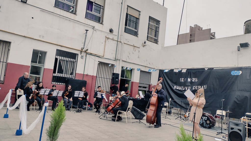 RocioMVG's tweet photo. Acto de imposición de nombre de la EESN°28, ahora llamada "Gustavo Ceratti". 
Felicitamos a los estudiantes por regalarnos un hermoso momento cantando y tocando con distintos instrumentos las canciones de quién lleva hoy, el nombre de la institución.
¡Gran trabajo de todos! https://t.co/TrNg3woxd6