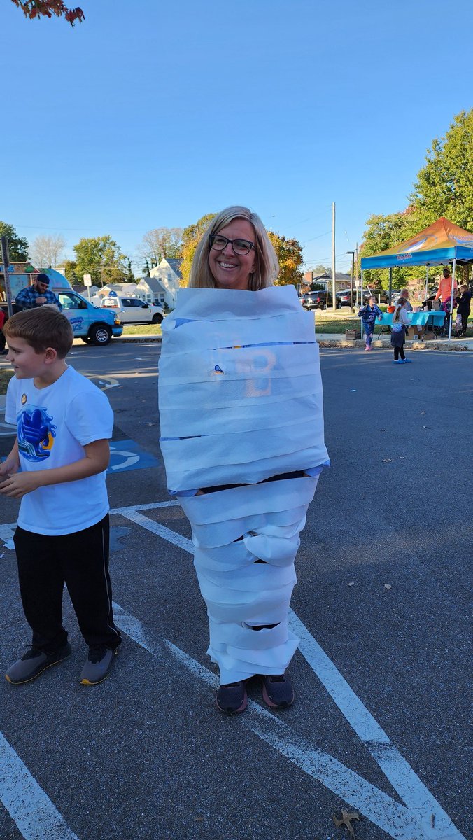 MrsScheeler2grd's tweet photo. Ms. Field getting mummified during @TheBeach_AACPS Fall Fest! Everyone had a blast! #fallfest #aacps #awesomeprincipal https://t.co/hI8M8ucroY