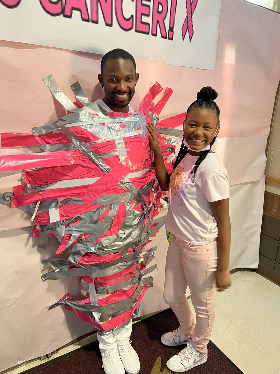 October is Breast Cancer Awareness Month and today was Stick it to Cancer Day at The ‘Shire! Students were able to tape Principal Knapp and Mr. Cunningham to the wall to support cancer research! It was a very STICKY situation! 😂💘 #TheShire901 #GreatnessAtGermanshire