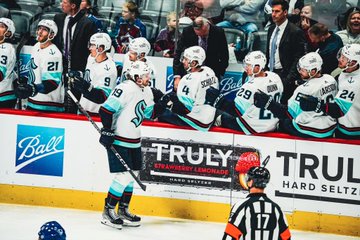 McCann going thru fist bump line on kraken bench after scoring