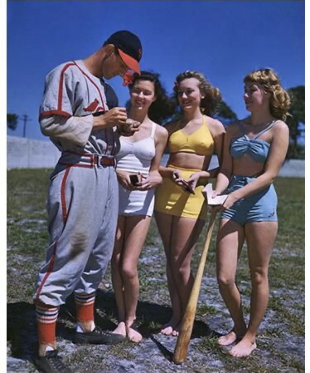 Stan Musial signing a few autographs