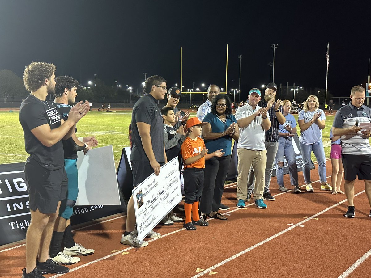 ZachAlvira's tweet photo. Highland safety Joseph Allen and OL Makua Pule this year’s recipients of the Marquis Cooper Scholarship Award. Ryan Fitzpatrick presented the checks to the two recipients. https://t.co/b3065ui92P