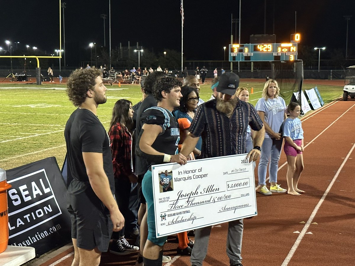 ZachAlvira's tweet photo. Highland safety Joseph Allen and OL Makua Pule this year’s recipients of the Marquis Cooper Scholarship Award. Ryan Fitzpatrick presented the checks to the two recipients. https://t.co/b3065ui92P