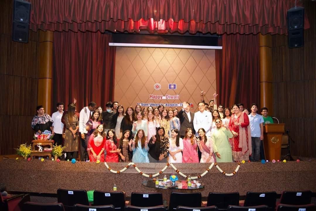 UniversitySiam's tweet photo. Happy Diwali 
Festival organized in Siam University to celebrate the light by international students.
May every bright light shine on you all. https://t.co/z80yoFh39g