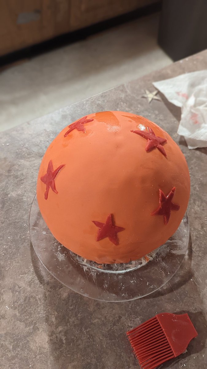 JAGG_GAMES's tweet photo. My youngest son's birthday party is tomorrow and he wanted a Dragon Ball Z party. So I made him a #DragonBallZ cake he's 5 and I know the star pattern isn't correct but I did it that way so I can put the  candle in the center. https://t.co/KPfkXQ7v0k