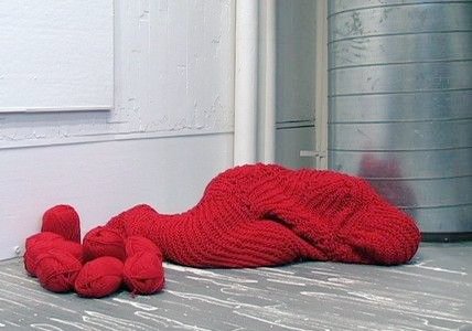 Performance art piece by artist Bea Camacho entitled "Enclosure", crocheting a cocoon for herself in 11 hours without interruption #WomensArt