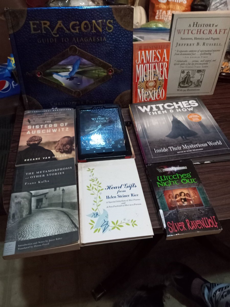 #readathon is about to start 
TBR piles left is some of mine I have a couple more on Kindle I'd like to get to today.
Mom's pile is on the right she's feeling ambitious lol