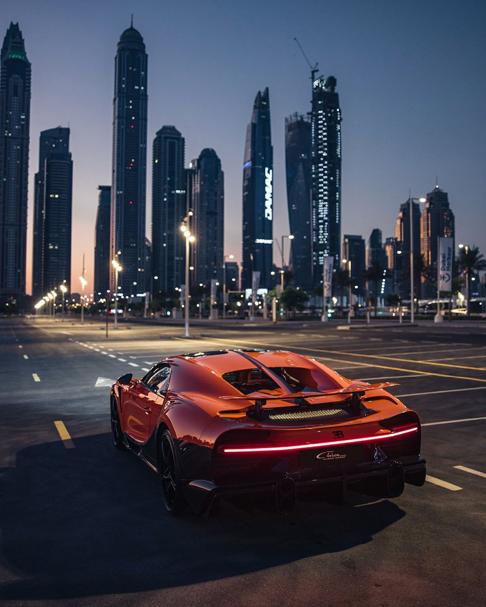 Nestled among the high-rise skyline of Dubai, a longtail, Tangerine-colored masterpiece roams the empty highways at dawn, showcasing the pinnacle of longitudinal performance.

#BUGATTI #CHIRONSuperSport #Dubai
–
bugatti.link/consumption