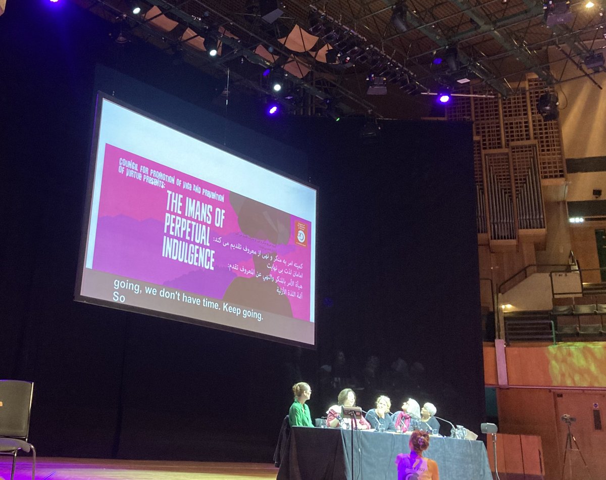 artefactoid's tweet photo. #FiLiA2022 Maryam Namazie #religiousfundamentalism encompasses Christian, Muslim, Hindu & Buddhist fundamentalism. Framed as women provoking men. They are provoking us! Using mockery ‘promoting Vice’ at #Pride and the slogans #AllahIsAWoman #AllahIsALesbian #WomansQuran is blank. https://t.co/L40l9T8yAg