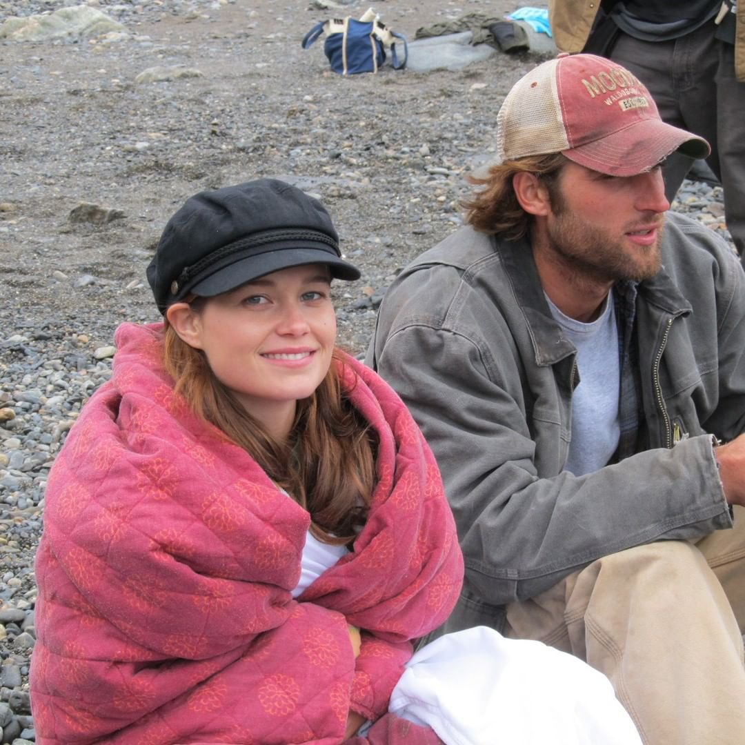 schooksource's tweet image. photo shared by @/theghosttrapmaine on IG: “SC and Zak in between takes...on a cold day on the beach.”