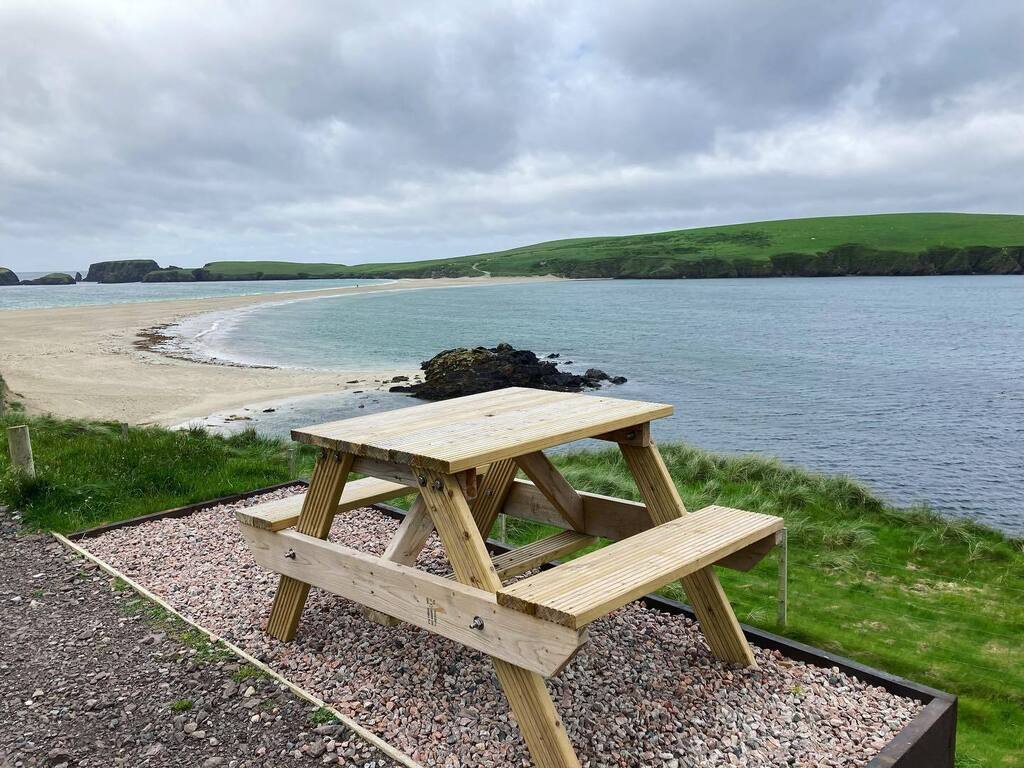 TravelGalCFC's tweet photo. Looking out from Mainland Shetland, across the causeway to St Ninian’s Isle. We had a pleasant walk and exploration of the ruins and “sheep poop obstacle avoidance” exercise back in June. It was a cloudy day and occasionally dropped a few raindrops on us… https://t.co/Vq8ZD77lXA https://t.co/irkVNkPExS