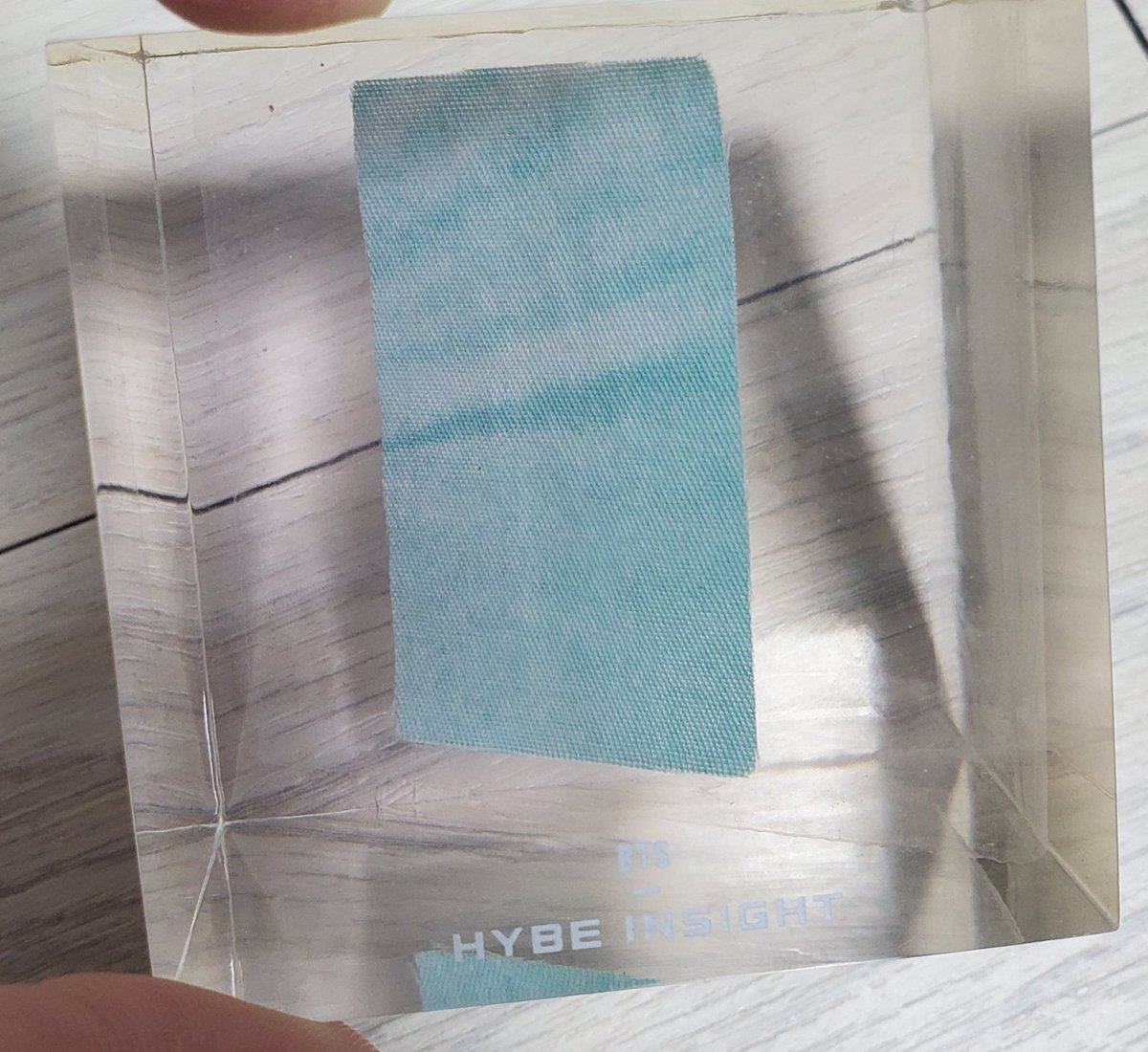bangtanniestyle's tweet photo. Okay trying my luck at finally figuring this out. I got this at HYBE Insight earlier this year. No clue on which member or outfit this is from. Any detective ARMY out there with an idea? 💜 #recode #btsrecode #HYBEINSIGHT #BTS https://t.co/1ldGYuvBuE